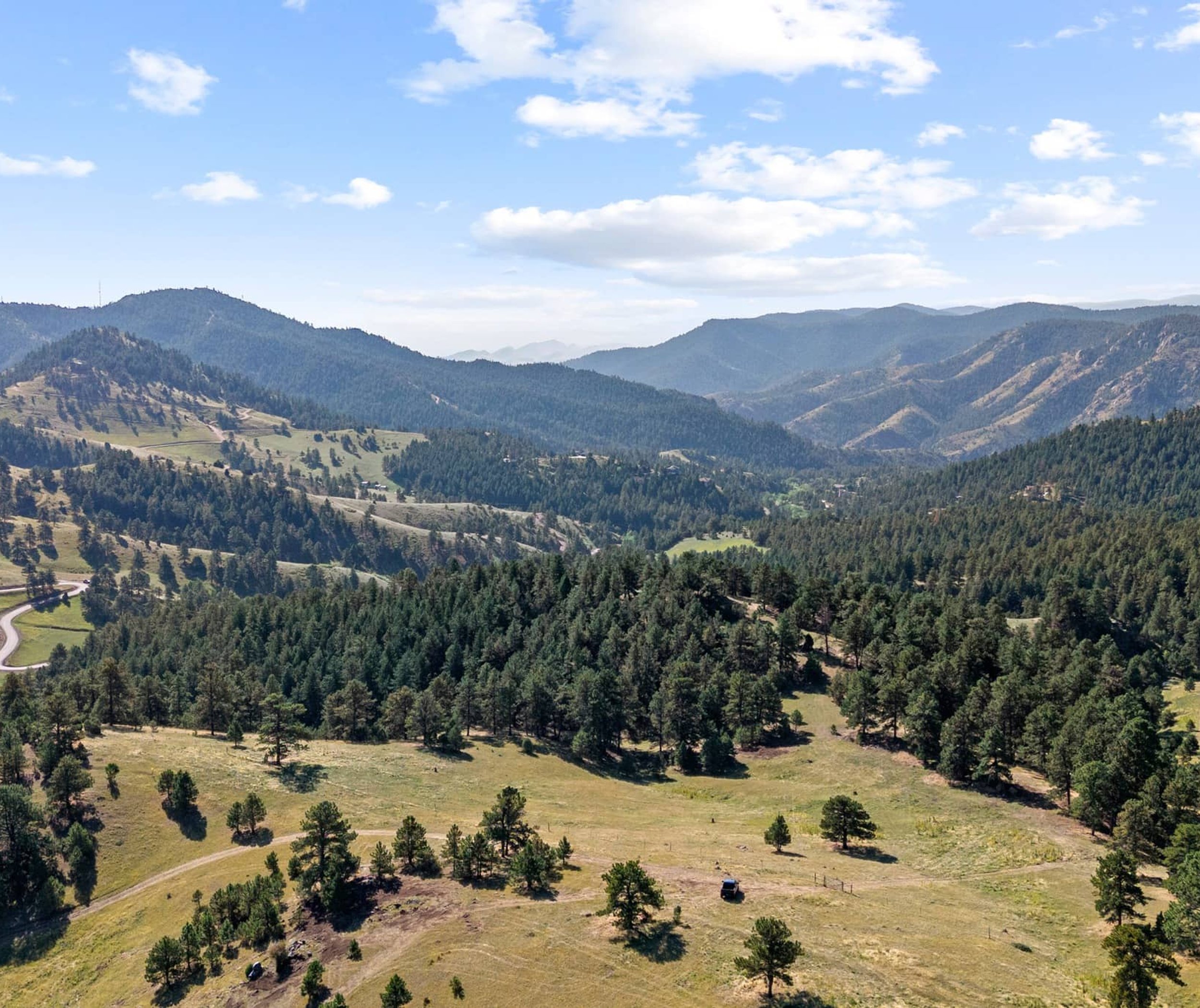 Colorado mountain landscape overlooking neighborhoods